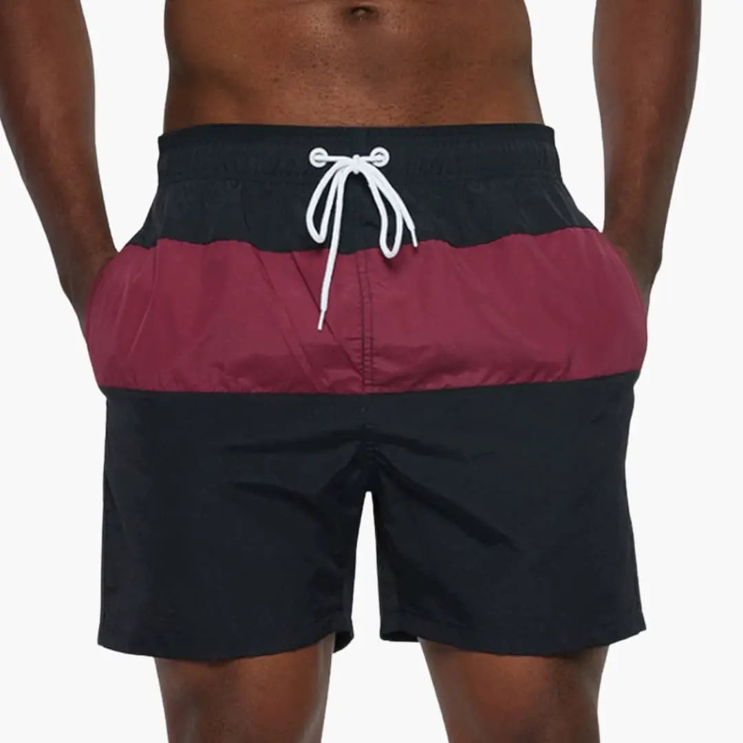 Men's striped swim trunks with drawstring waist, color-blocked black and burgundy, Wilfred Smith boardshorts