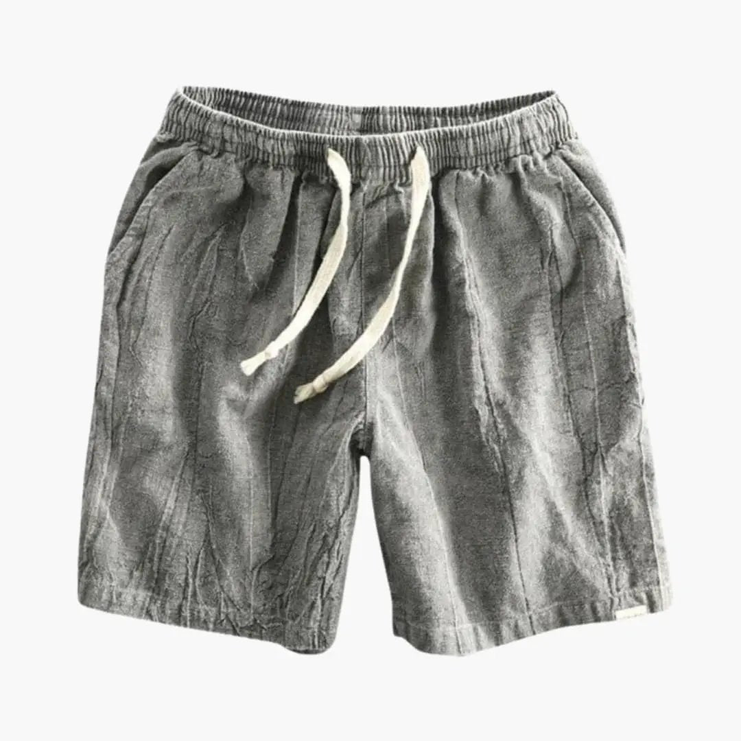 Men's grey jogger shorts with elastic waistband and drawstring