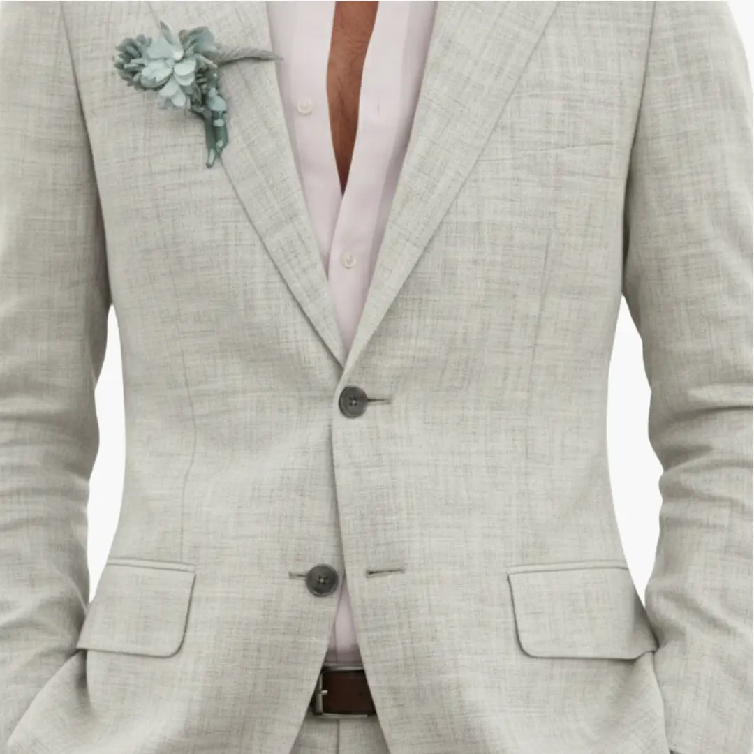 Men's wedding two-piece suit by Wilfred Smith, light gray with notched lapel and button closure.