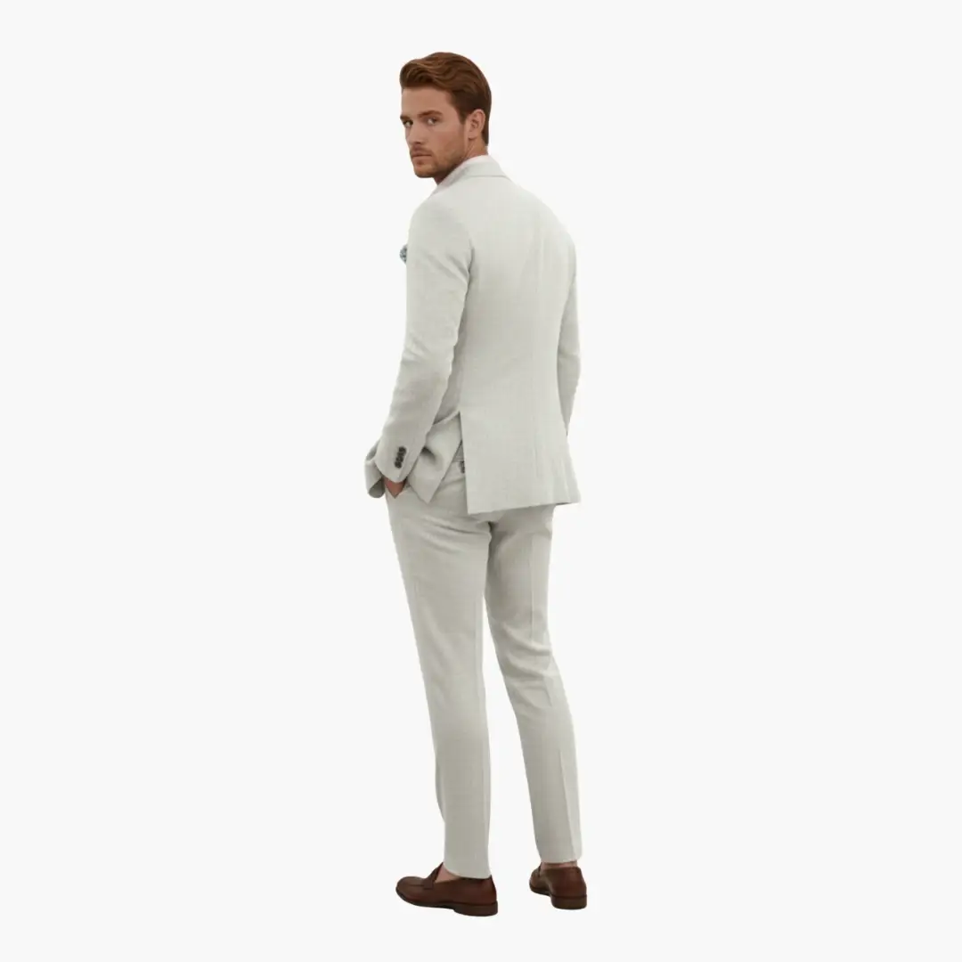 Wilfred Smith men's two-piece wedding tuxedo in light beige with notched lapels.