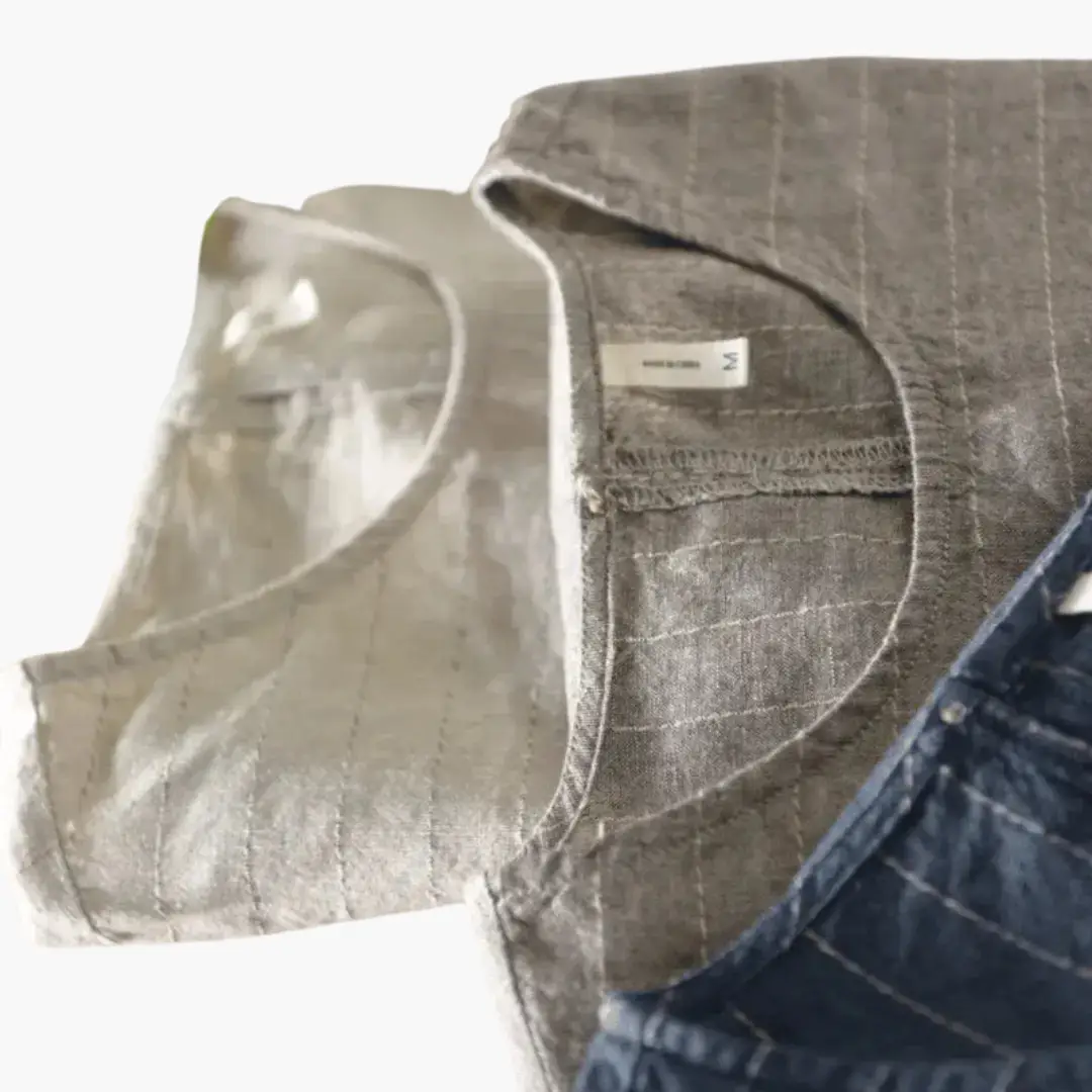 The Geneva Short Sleeve T-Shirt in gray pinstriped fabric, size M tag visible
