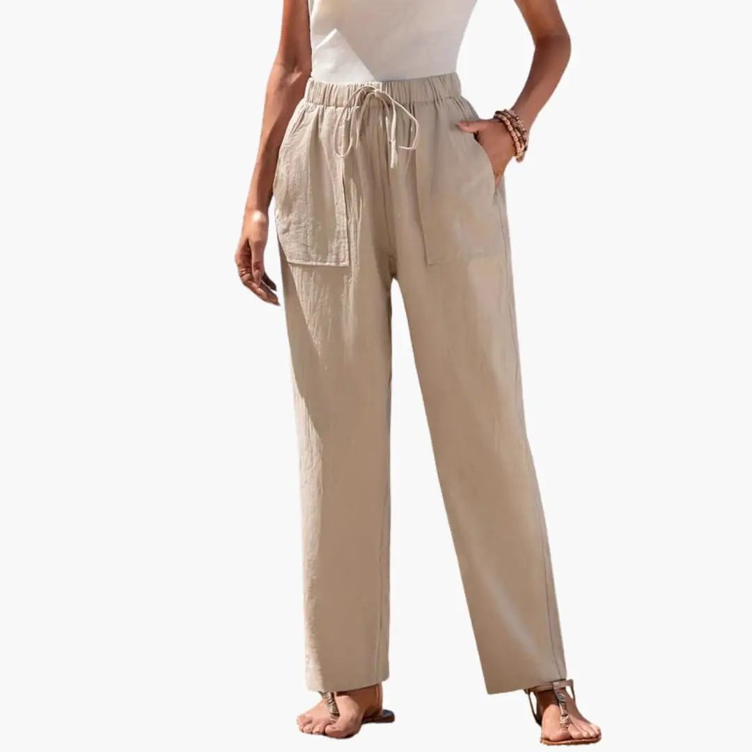 Women's beige linen-like beach trousers with elastic waist, drawstring, and side pockets
