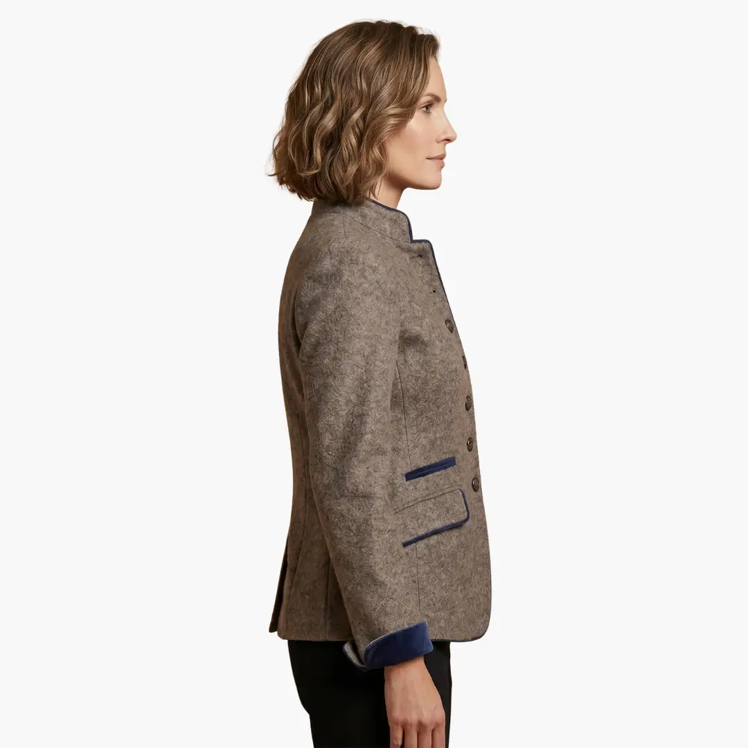 Women’s blazer in brown tweed with lapel collar, navy trim, button-front closure.