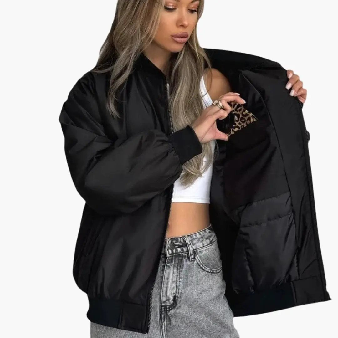 Women’s bomber jacket, black quilted with leopard-print inner pocket and elastic cuffs