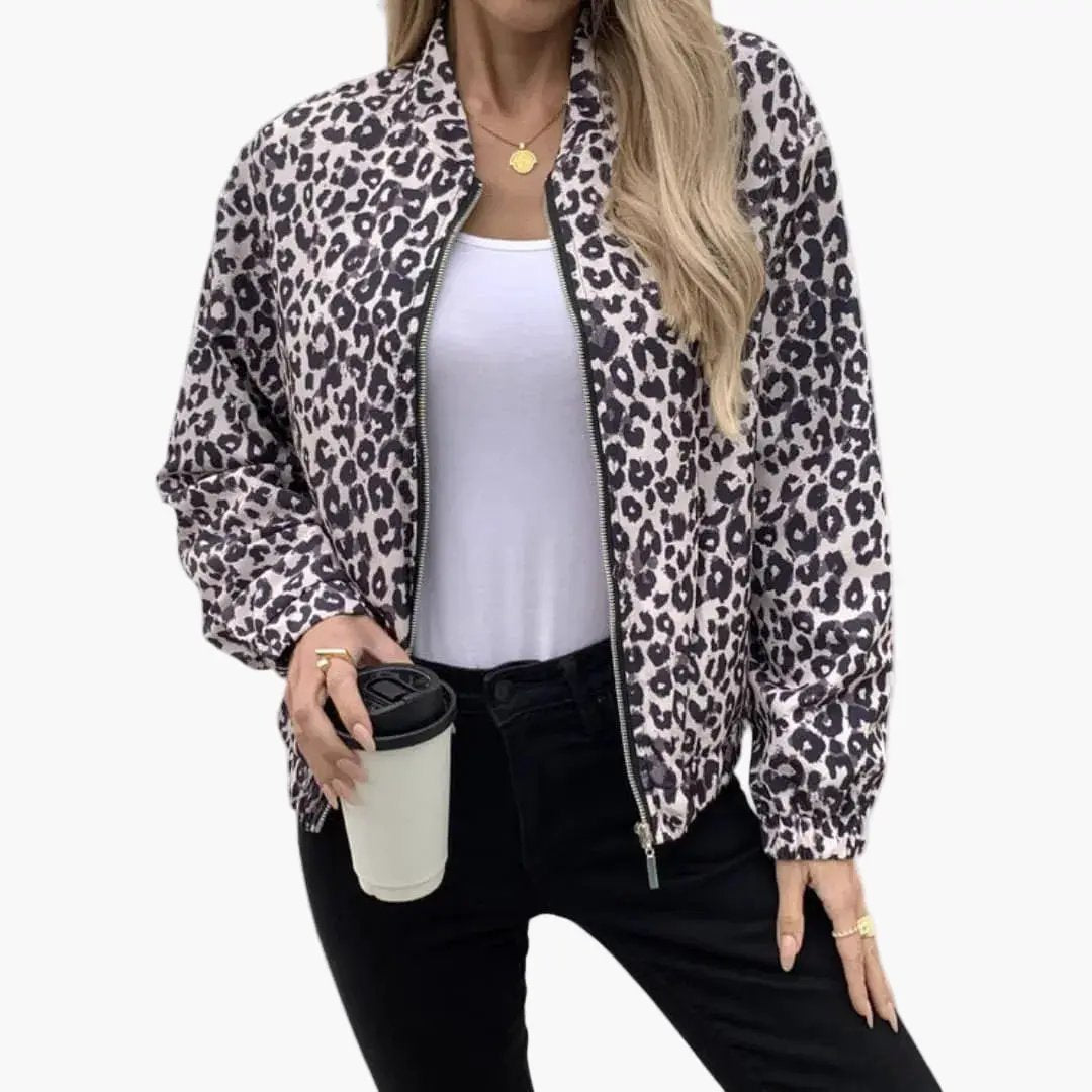 Women’s bomber jacket by Wilfred Smith in leopard print with zip front and elastic cuffs.