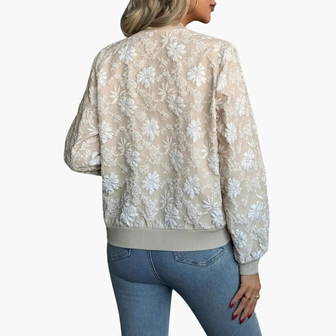 Women’s bomber jacket in beige with white floral embroidery, back view