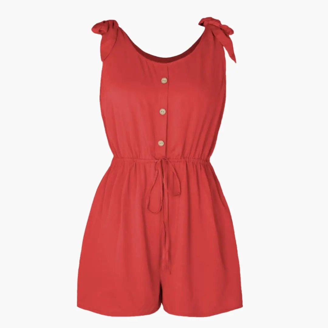 Women's button-front sleeveless jumpsuit with waist tie in coral red.