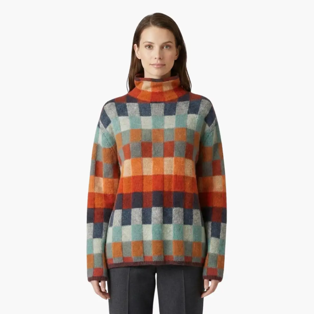 Women's checkered knit turtleneck sweater with relaxed fit in multicolor orange, teal, blue and gray squares