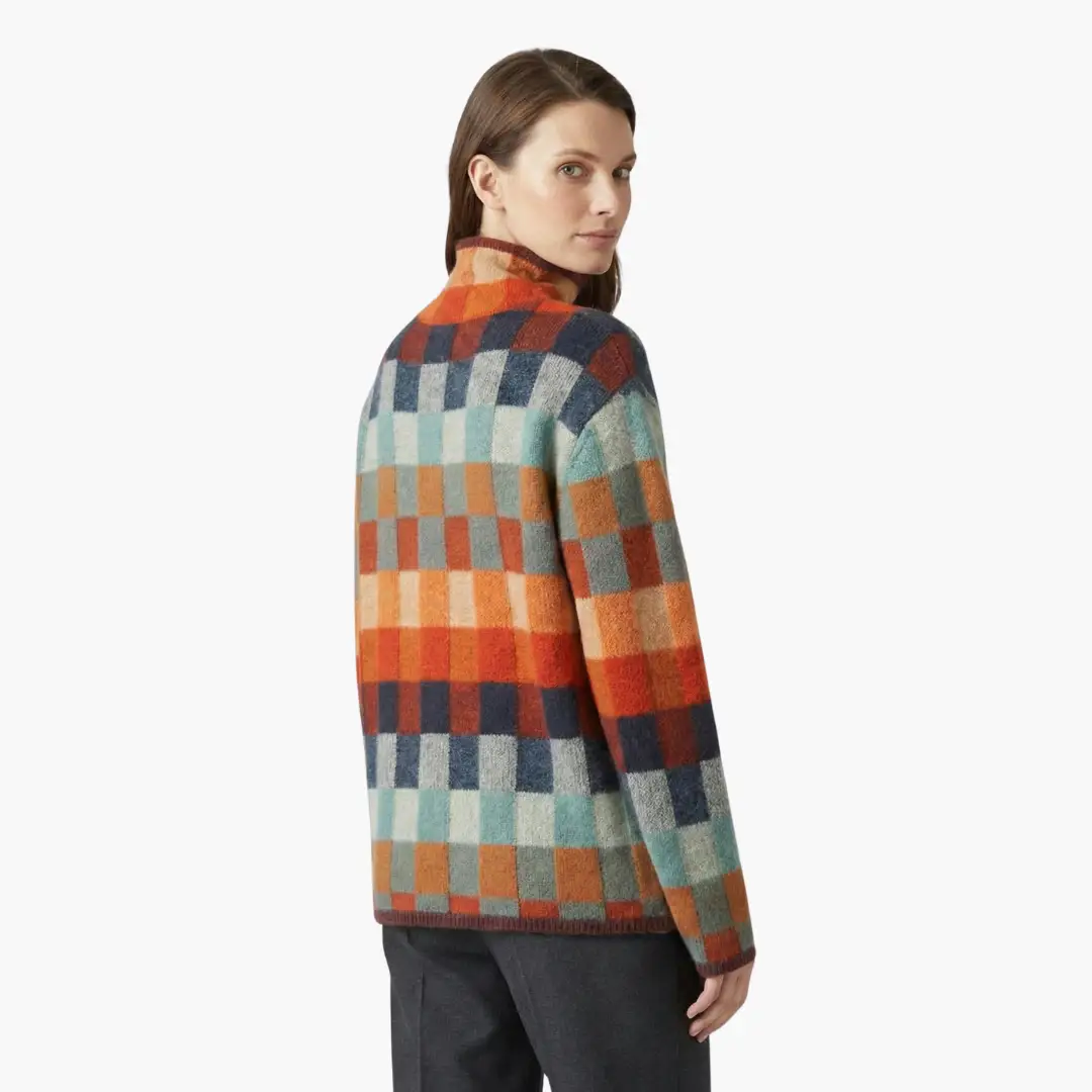 Women's checkered knit turtleneck sweater by Wilfred Smith, relaxed fit in orange teal navy blocks