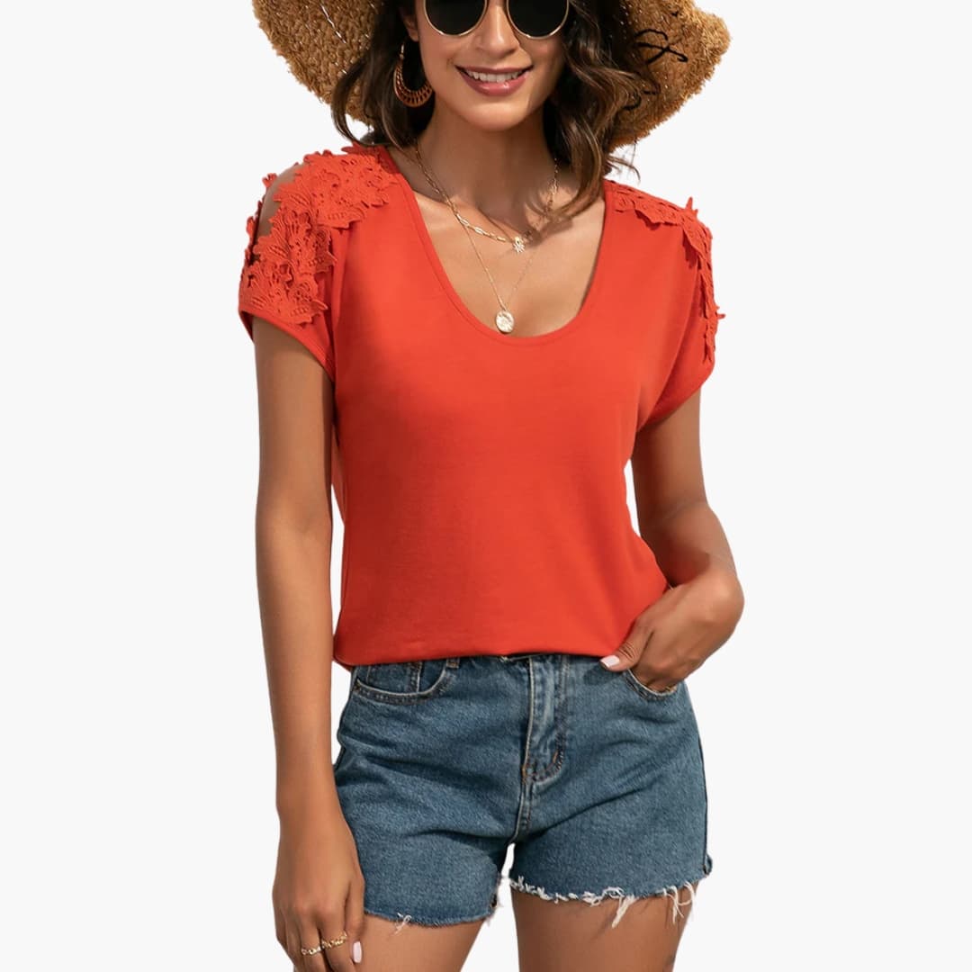 Women's short-sleeve T-shirt with crew neck and floral lace trim on shoulders, coral