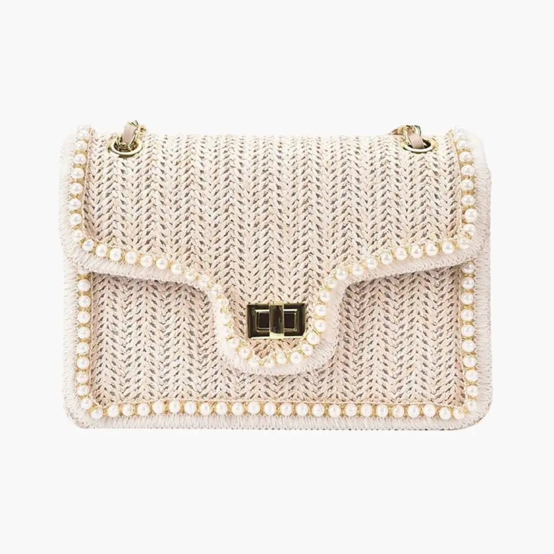 Women's handbag by Wilfred Smith with pearl-embellished trim and chain strap in beige woven