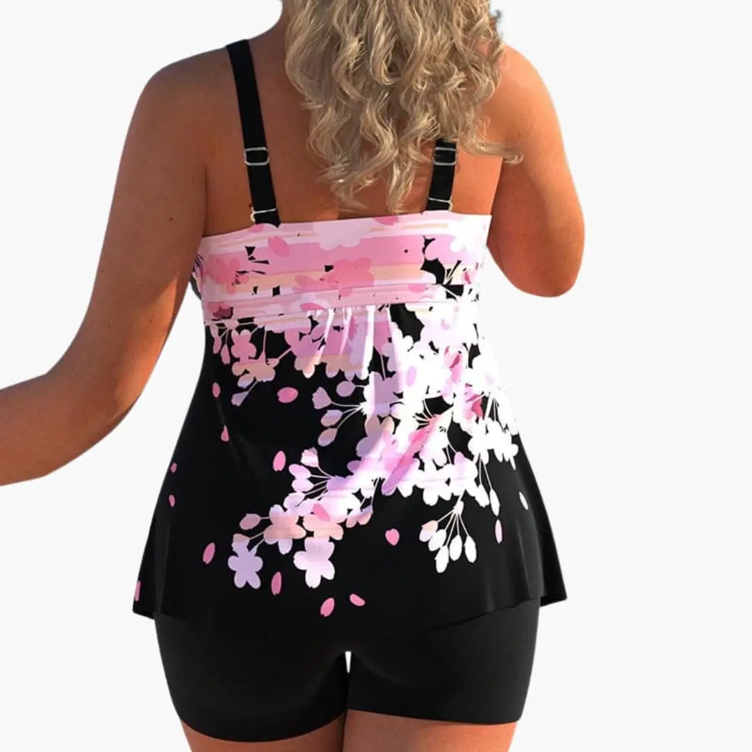 Women’s high-waisted bikini set with adjustable straps and ruffle trim, Wilfred Smith, pink floral top with black bottoms