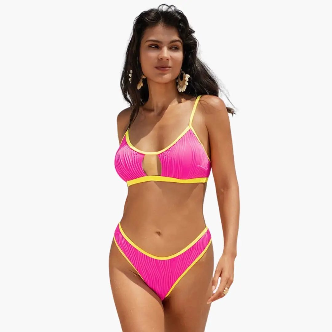 Women's high-waisted bikini set with sling strap top in bright pink with yellow trim by Wilfred Smith
