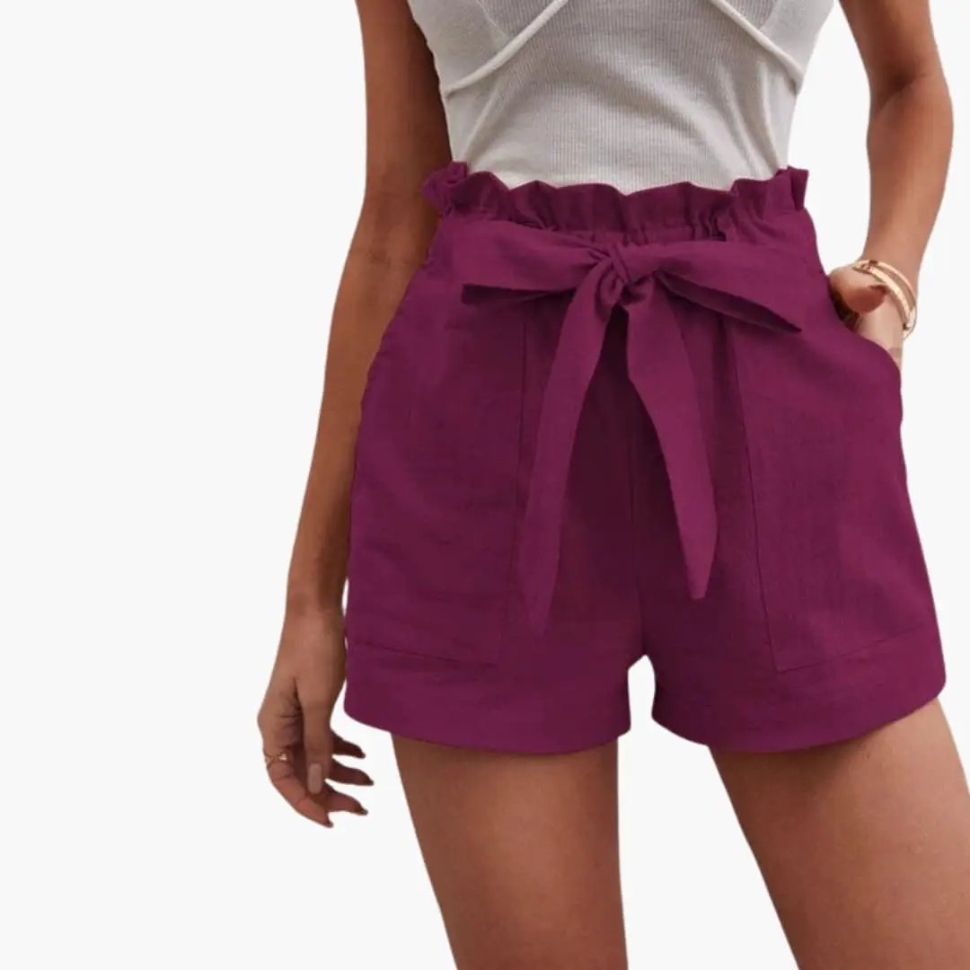 Women's high-waisted shorts in magenta with a drawstring waist and front pockets