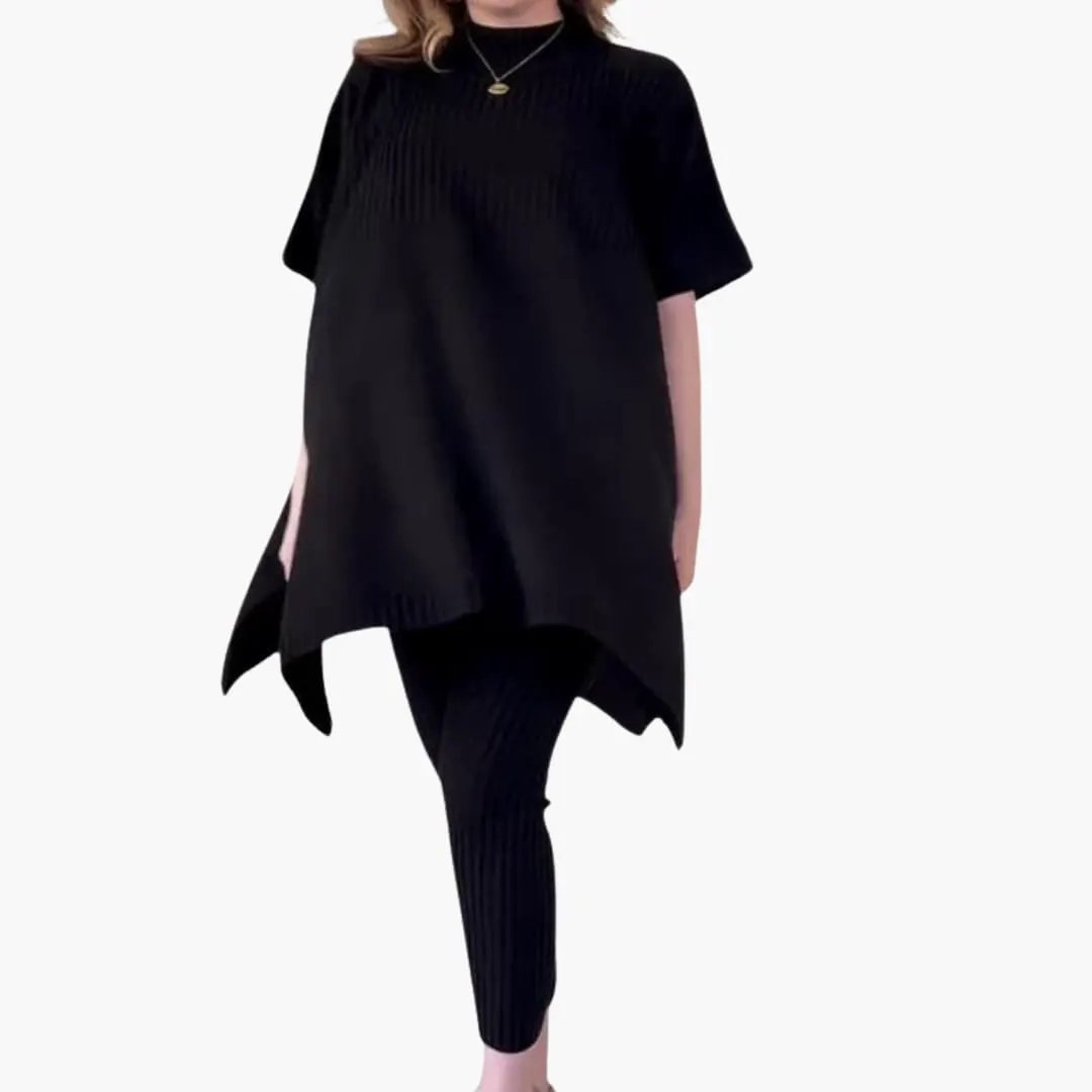 Women's knit two-piece set with black long-sleeve top featuring an asymmetric hem and matching straight-leg knit pants