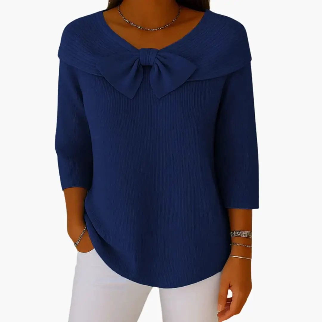 Women's navy blue knitted top with a bow neckline and long sleeves by Wilfred Smith