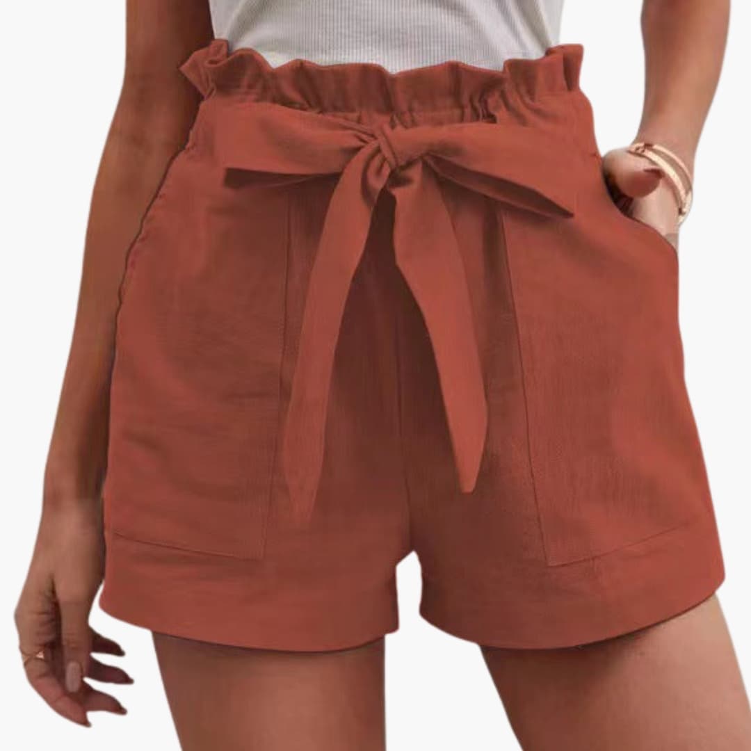 Women's rust linen shorts with tie belt, wide waistband and pockets