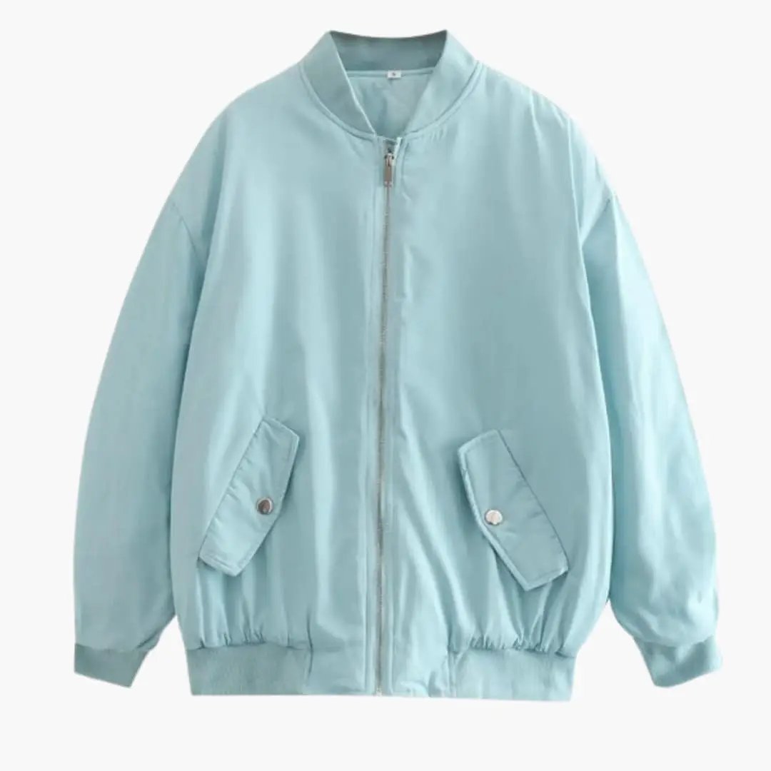 Women's oversized bomber jacket by Wilfred Smith in light blue with round neck, front zip and flap pockets.