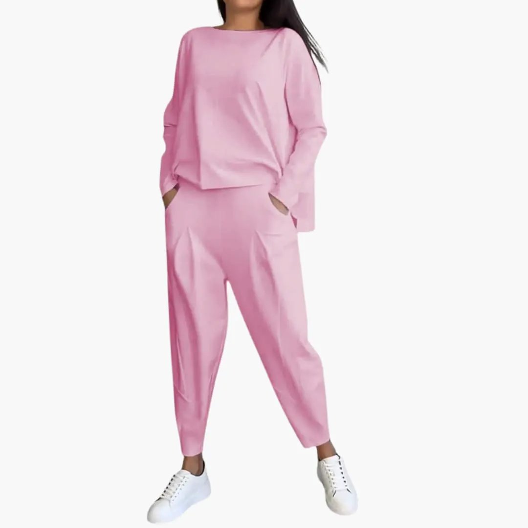 Women's long-sleeve two-piece outfit set in pink by Wilfred Smith with round-neck top and full-length pants