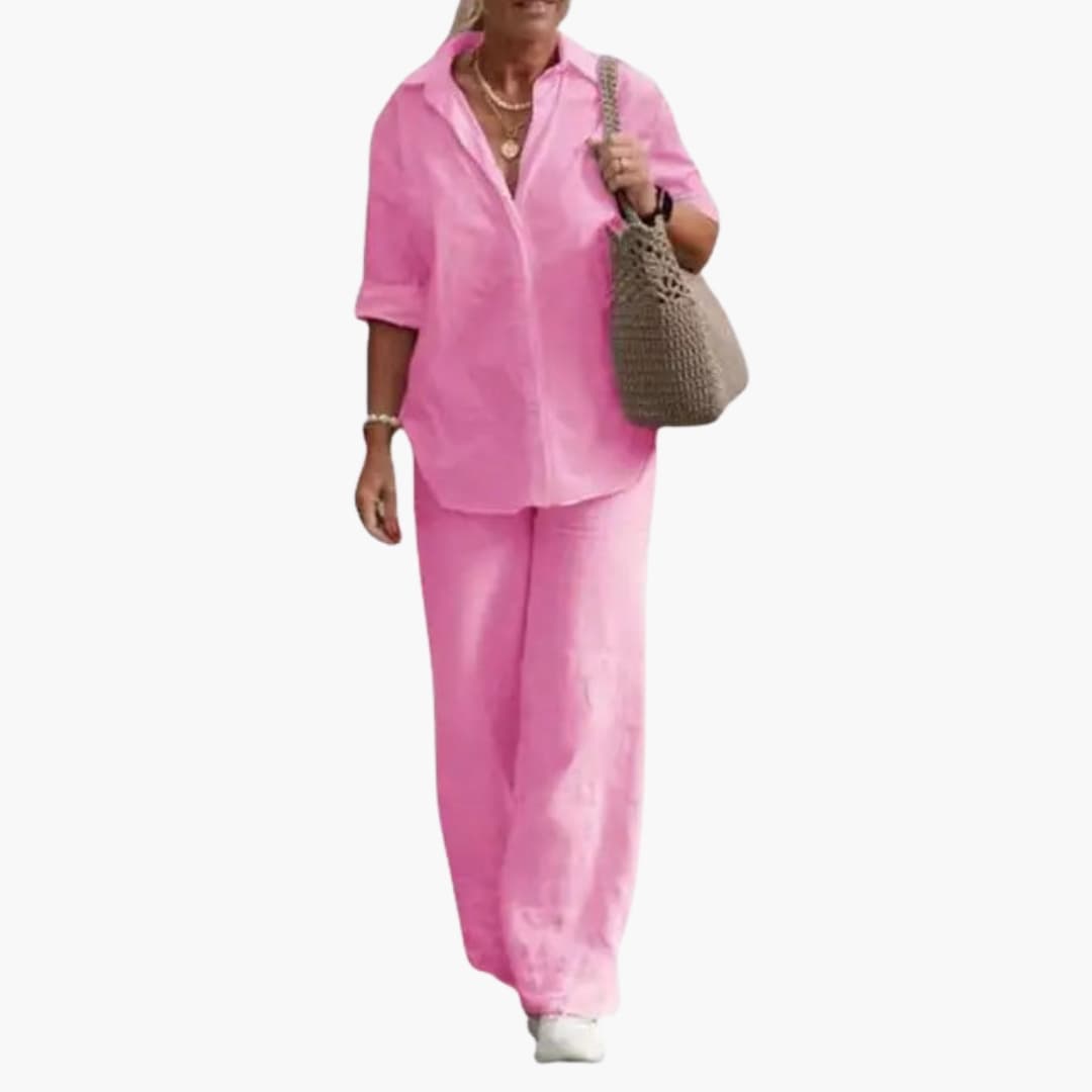 Women's pink two-piece outfit set with round-neck long-sleeve top and straight-leg pants.