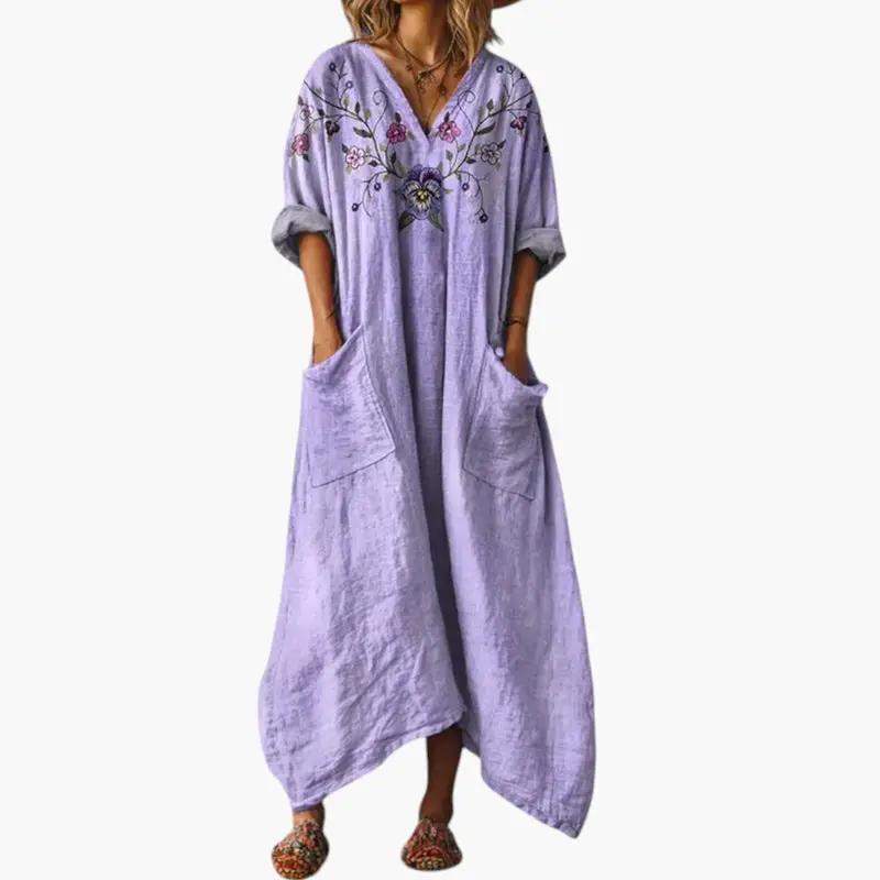 Women's lavender maxi dress with floral embroidery and front pockets, rolled sleeves