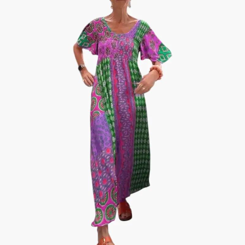 Women's midi dress with V-neck and short sleeves in a vibrant purple, pink and green print
