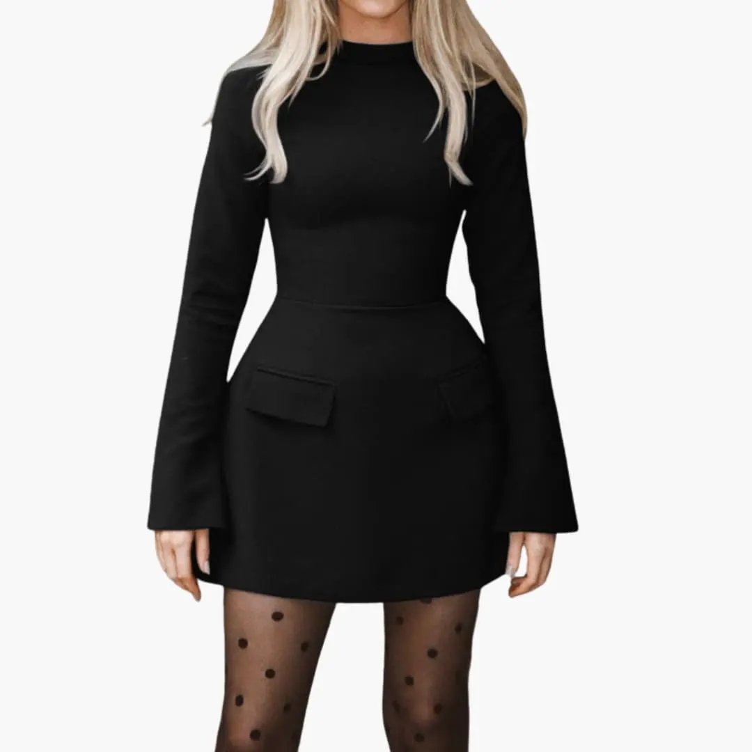 Women’s mini dress in black with a fitted waist, wide sleeves, and front flap pockets.
