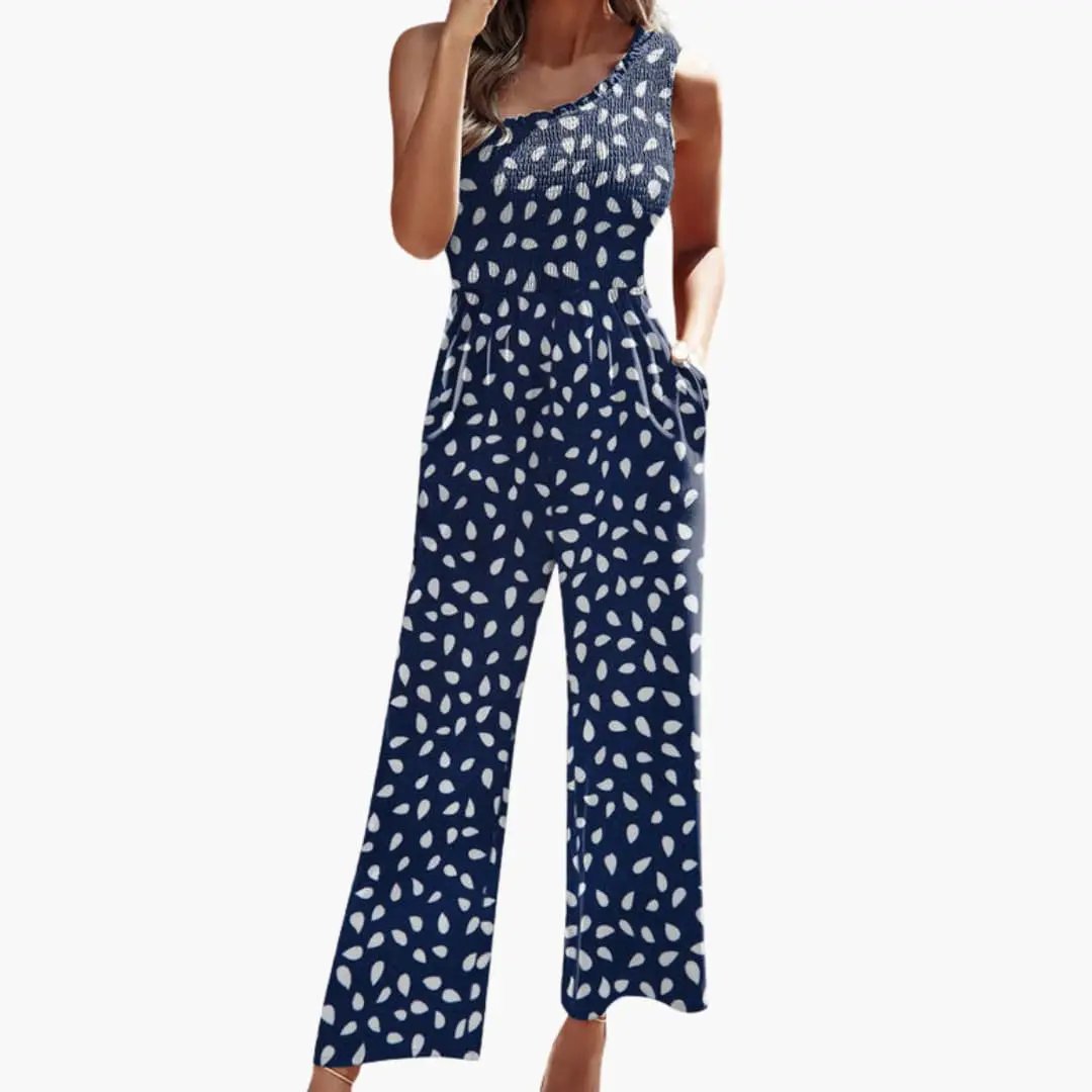 Women’s one-shoulder wide-leg jumpsuit in navy with white leaf print by Wilfred Smith