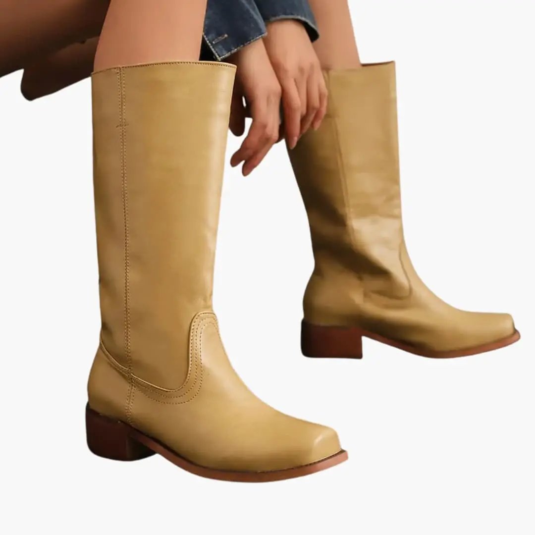 Pair of women's orthopedic knee-high boots in tan leather with a block heel