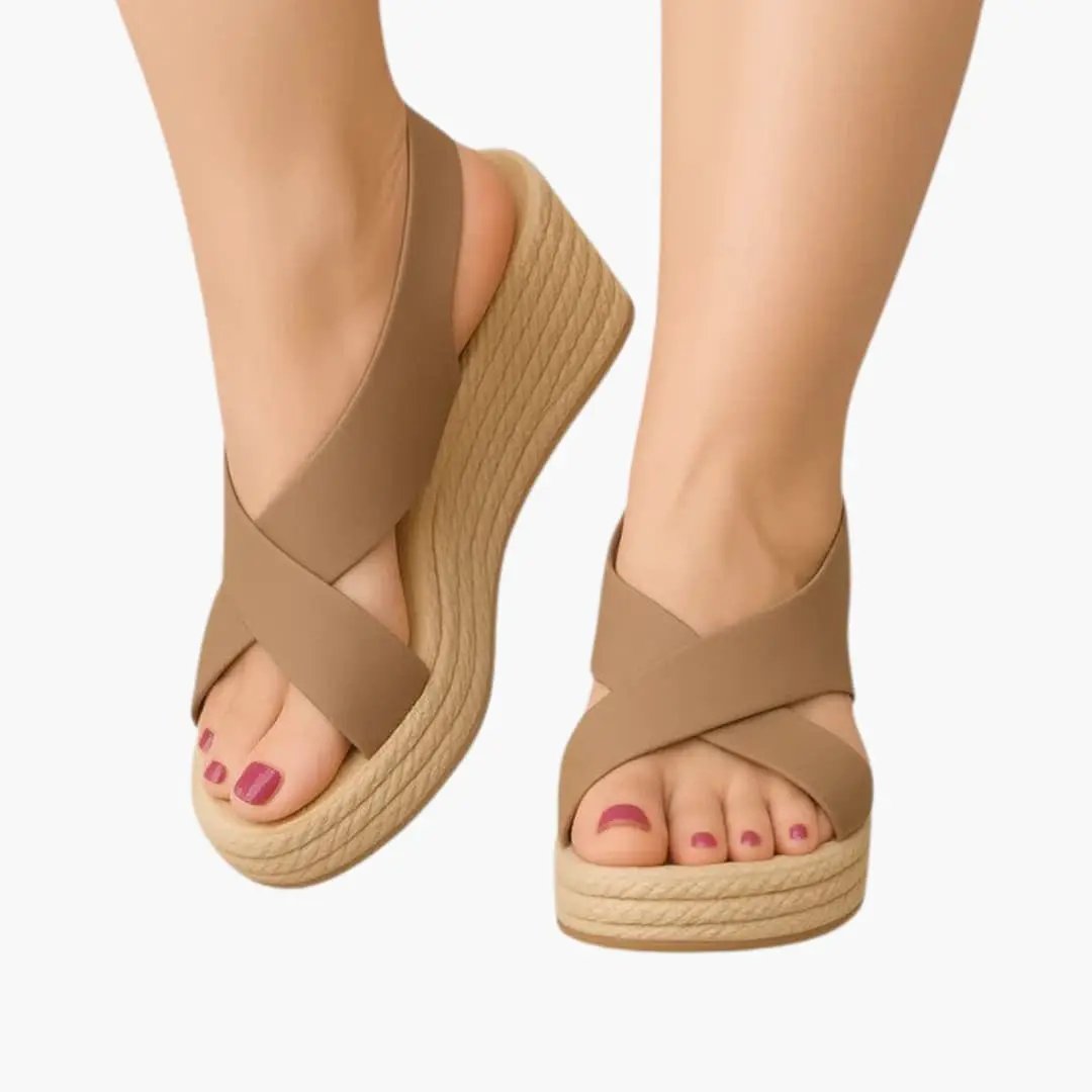 Pair of tan women's orthopedic sandals with wedge sole and criss-cross straps (open-toe)