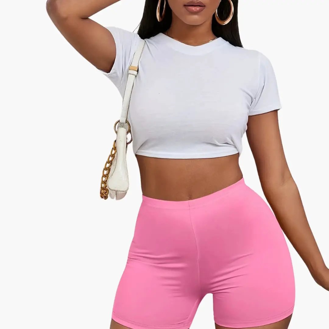 Women’s outfit set with cropped white T-shirt and pink shorts