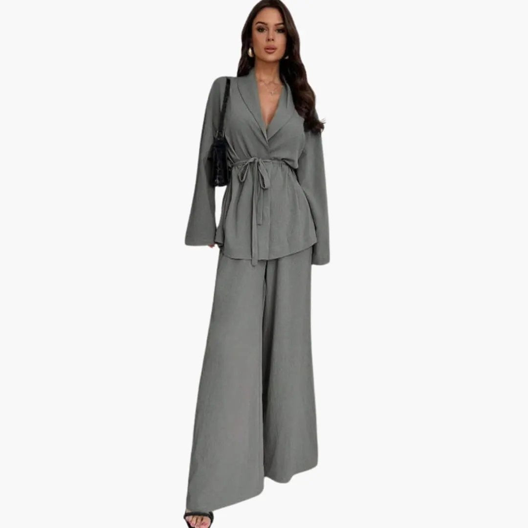 Women's gray oversized wide-leg jumpsuit with waist belt by Wilfred Smith