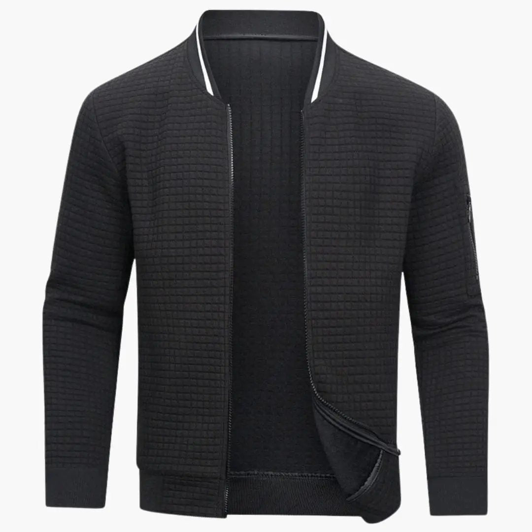 Women’s black quilted bomber jacket with zip-front closure and long sleeves