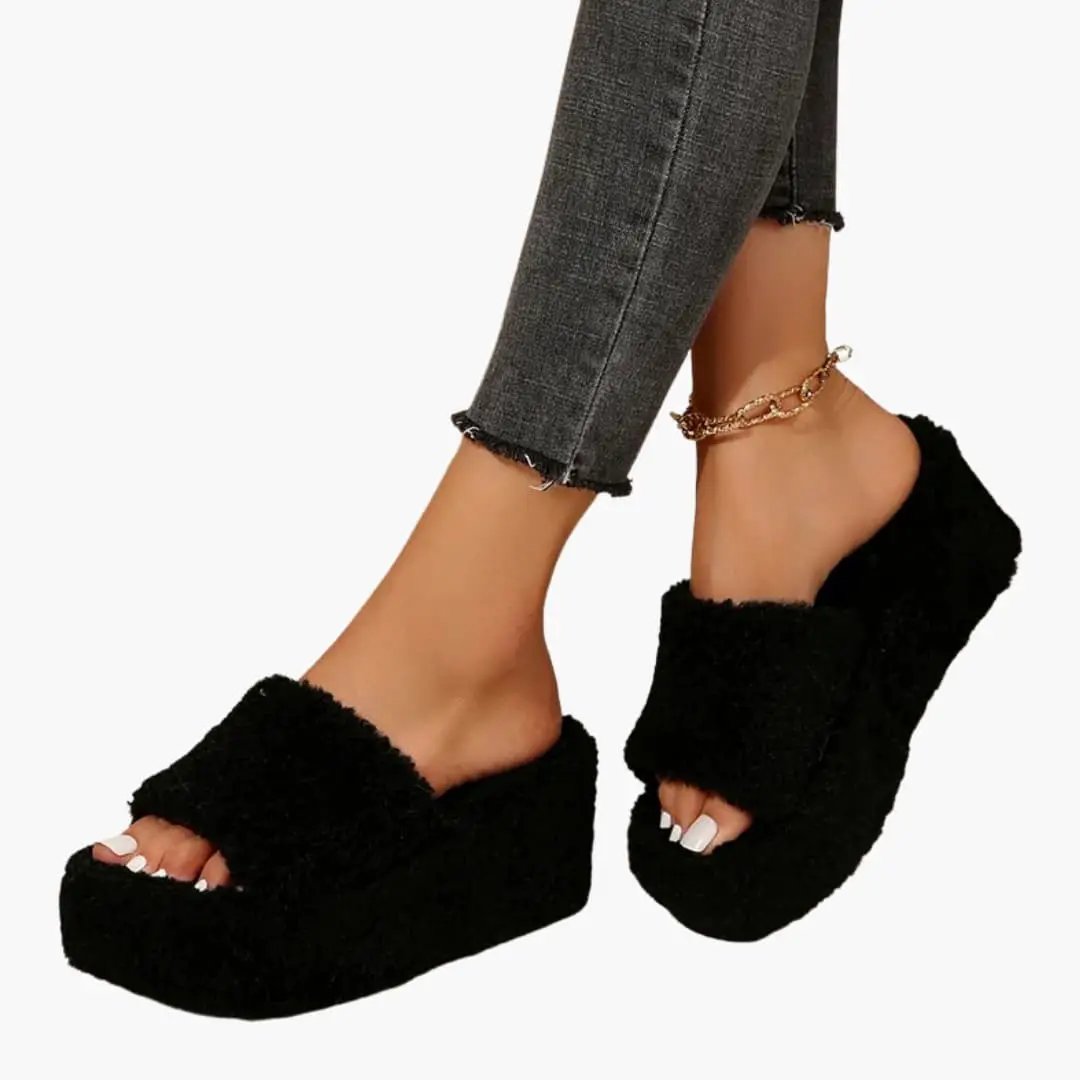 Women's platform wedge sandals by Wilfred Smith in black fuzzy material with contoured insole