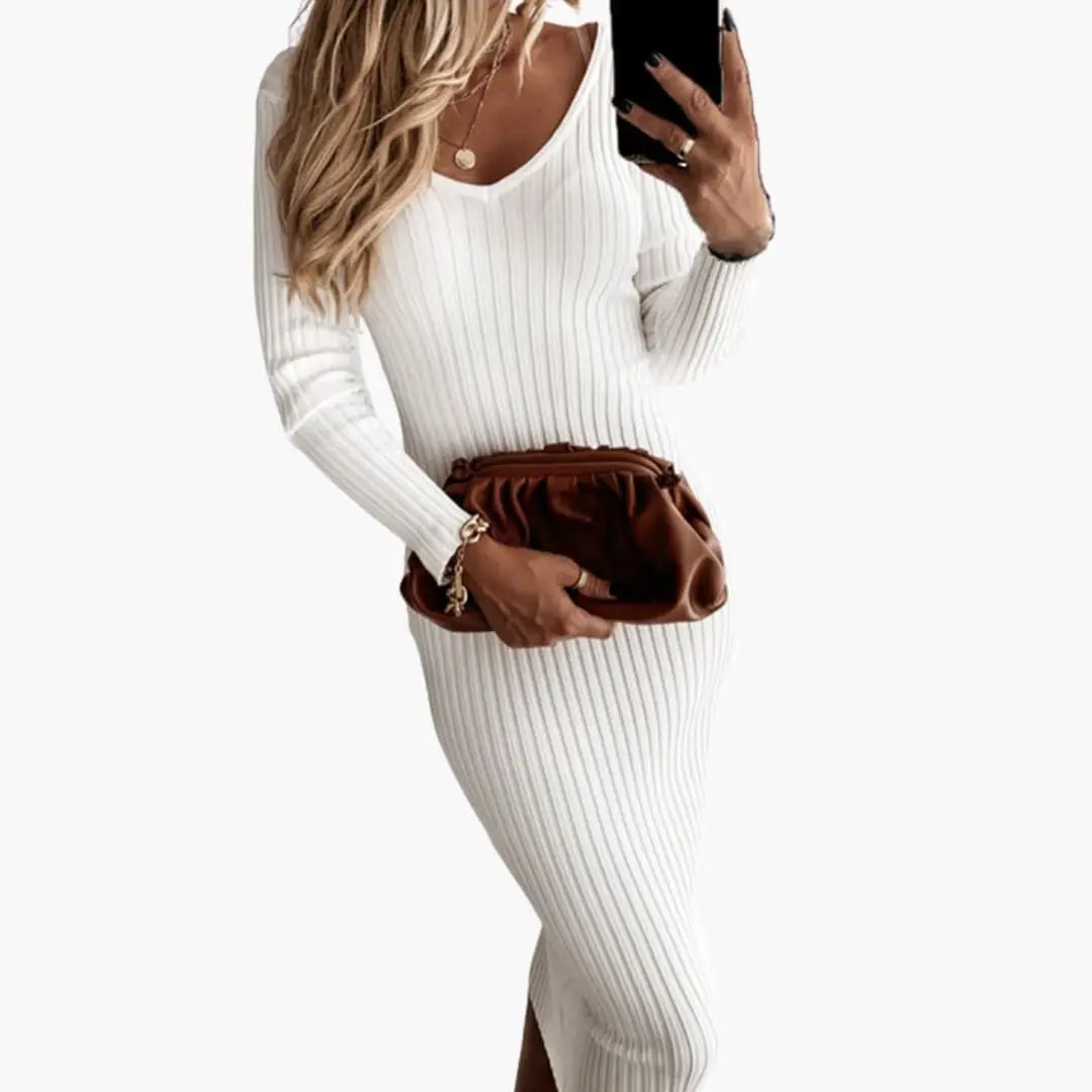 Women’s ribbed white midi dress with round neckline and long sleeves.