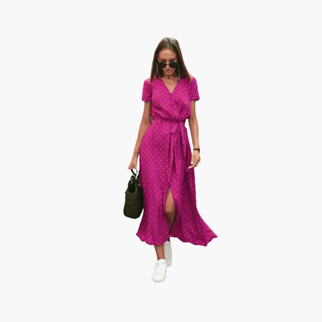 Women’s round-neck dress by Wilfred Smith in bright magenta with a dotted pattern and wrap belt.