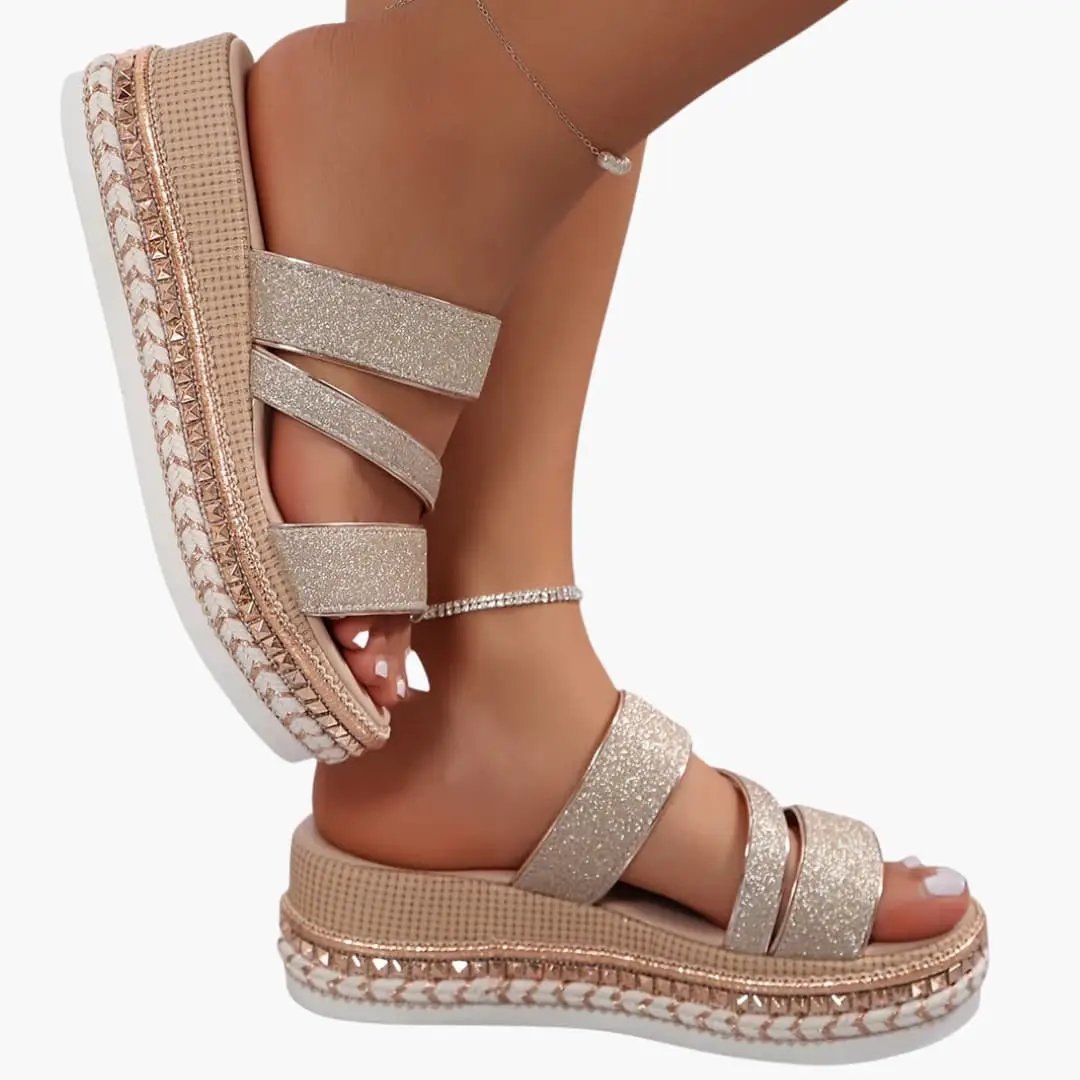 Women's Sandals with open upper and glittery champagne straps; contoured platform sole