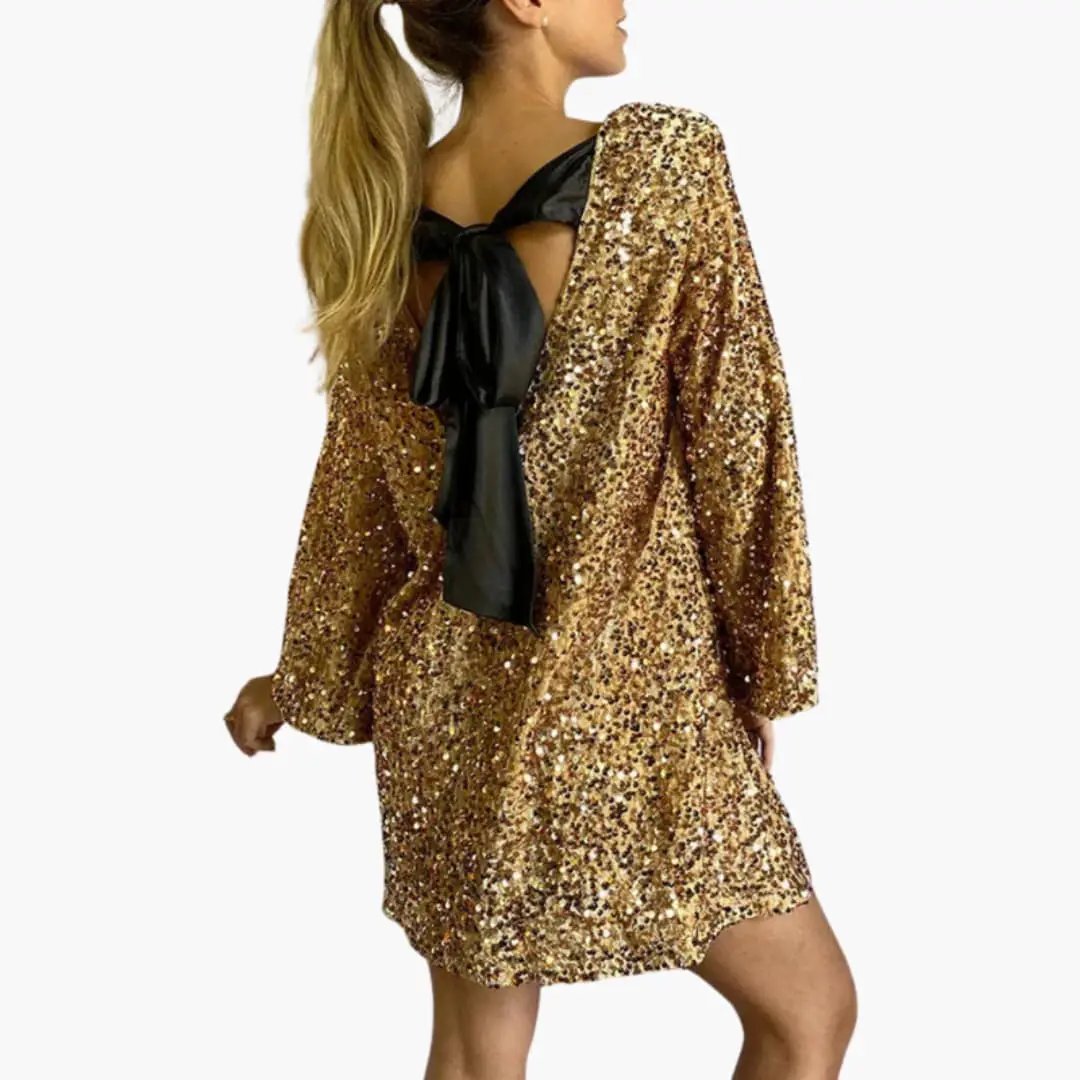 Women's gold sequin mini dress with back bow detail by Wilfred Smith