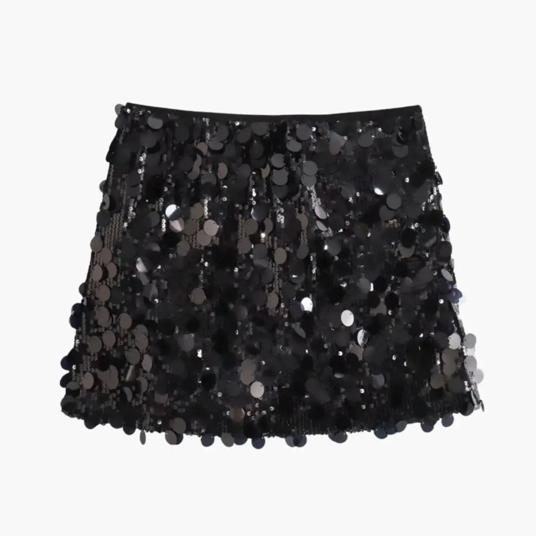 Women's black sequin mini skirt with a straight hem, densely adorned with round reflective discs.