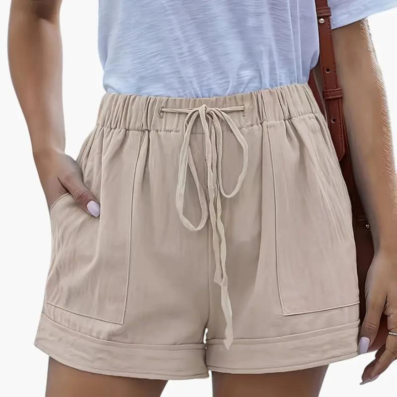 Wilfred Smith women's jogger shorts with drawstring waistband in beige, relaxed fit.