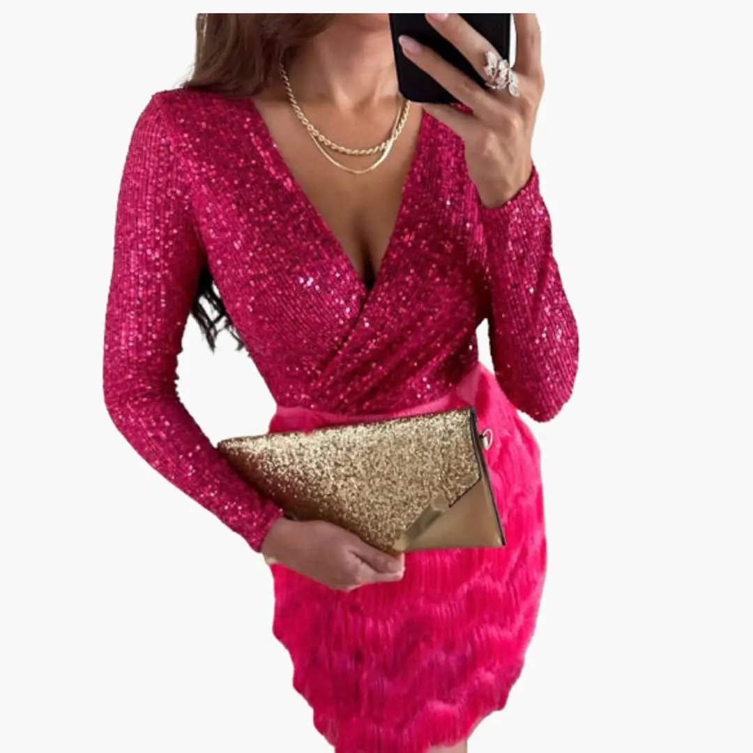 Women's pink sequin party dress with long sleeves, V-neck wrap, and fitted waist; gold glitter clutch.
