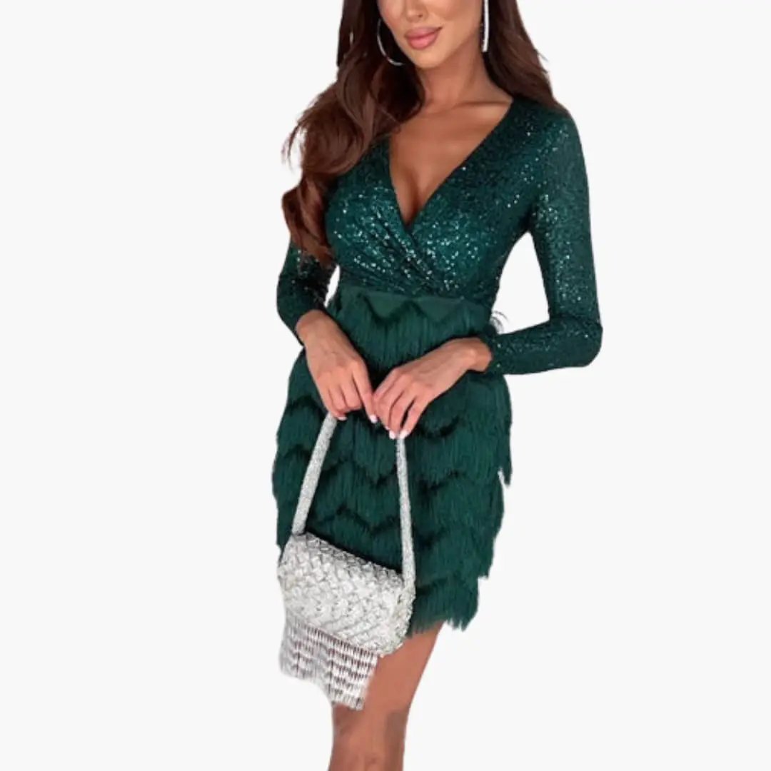 Women’s Party Dress in emerald green sequins with long sleeves, fitted waist, and fringe skirt