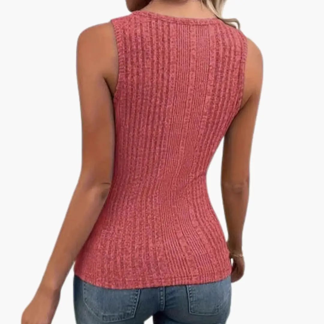 Women's sleeveless ribbed tank top in pink, knit texture worn with jeans