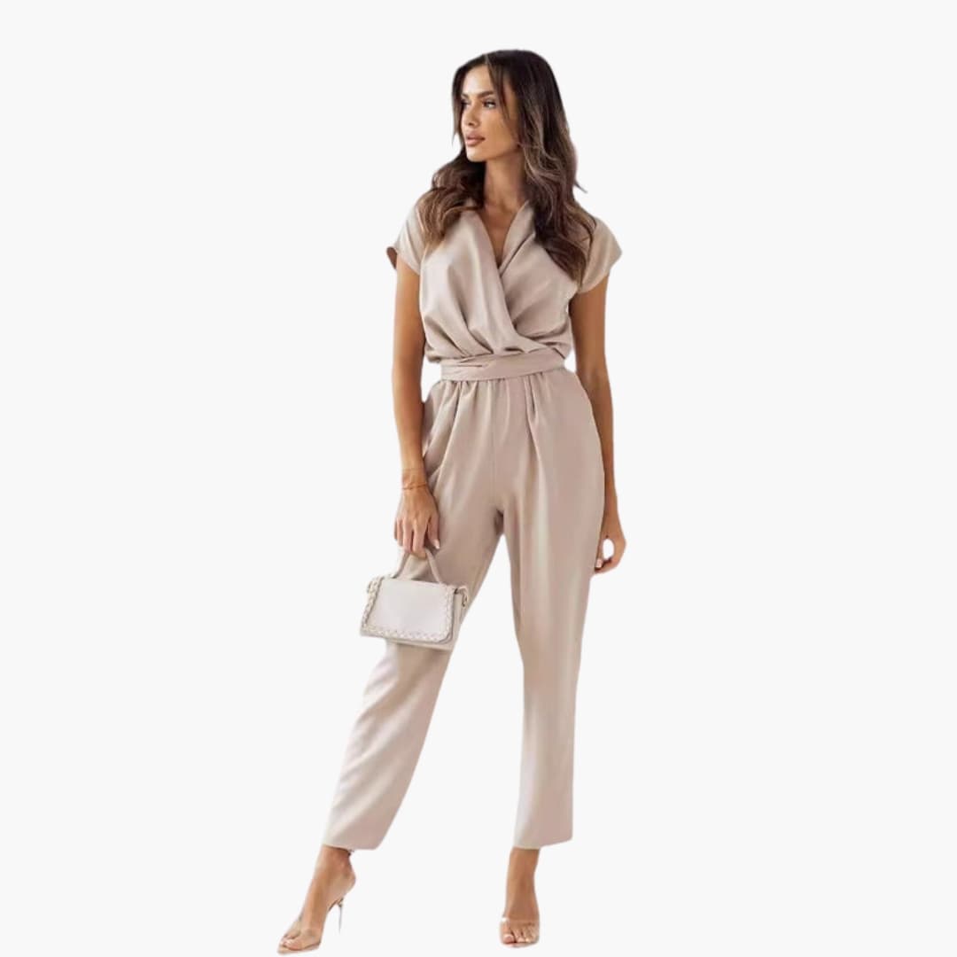 Women's sleeveless V-neck jumpsuit with waist belt in beige by Wilfred Smith