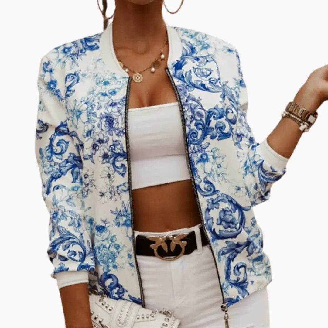 Women's sporty bomber jacket in white with blue floral print and front zipper.