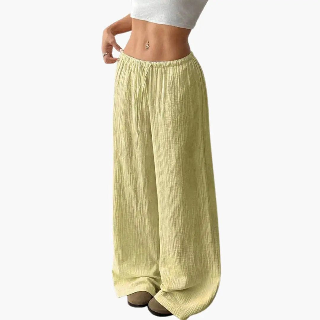 Women's summer wide-leg pants with elastic waist and side pockets, pull-on full-length trousers in pale yellow