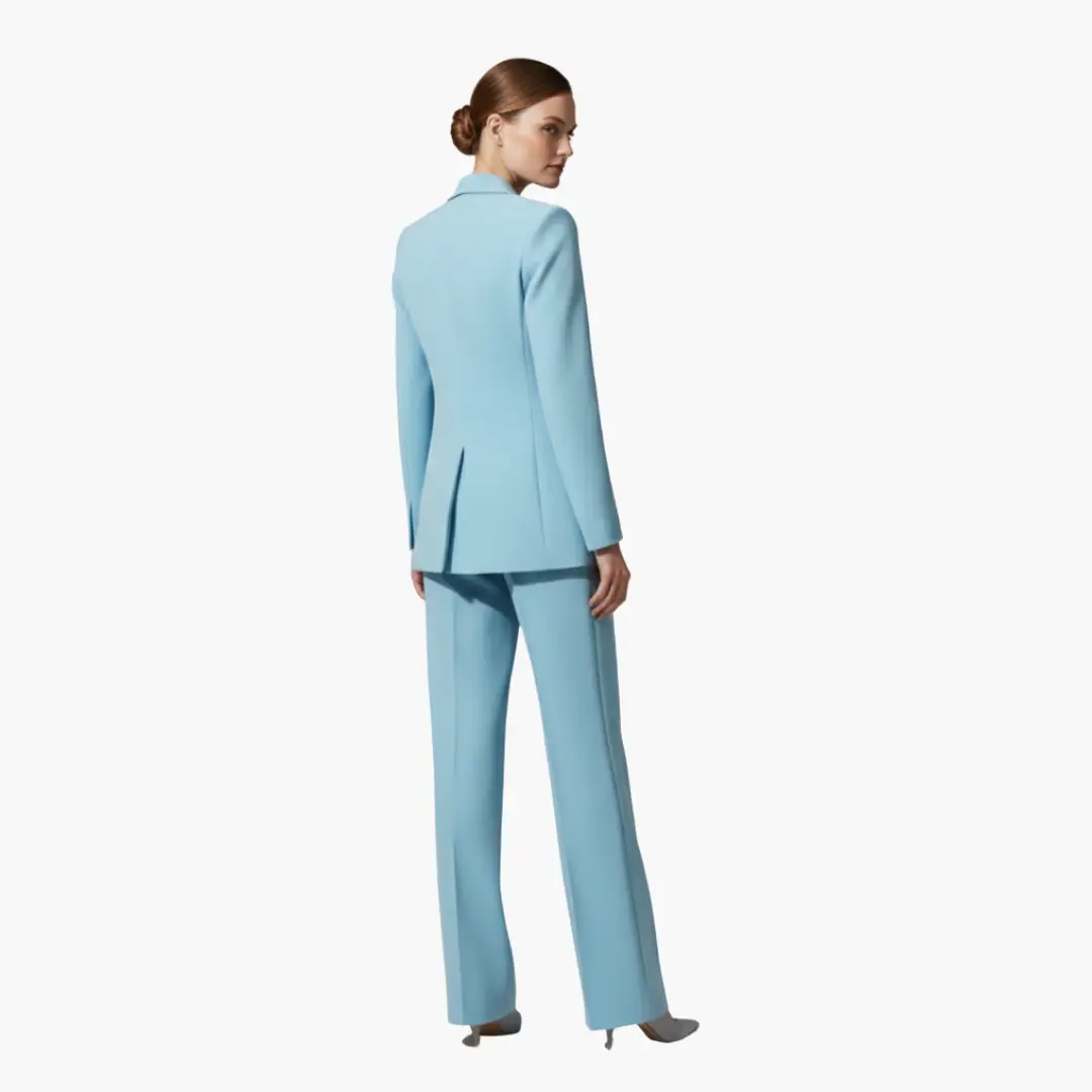 Two-piece women's blazer and pants suit by Wilfred Smith, light blue, back view