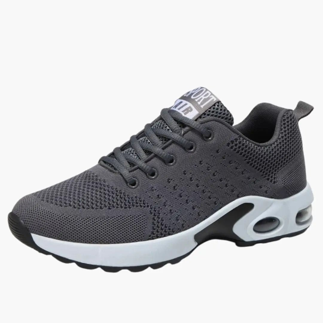 Women's trainers with cushioned sole and breathable dark gray knit upper; white sole with air-cushion detail.