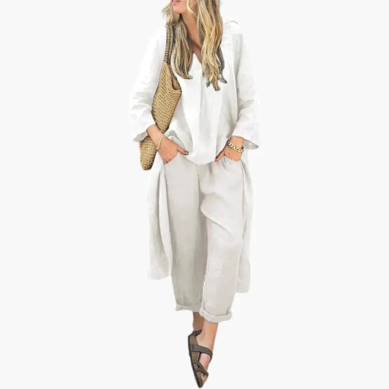 Women's two-piece outfit set in white linen with short-sleeve top and full-length pants by Wilfred Smith
