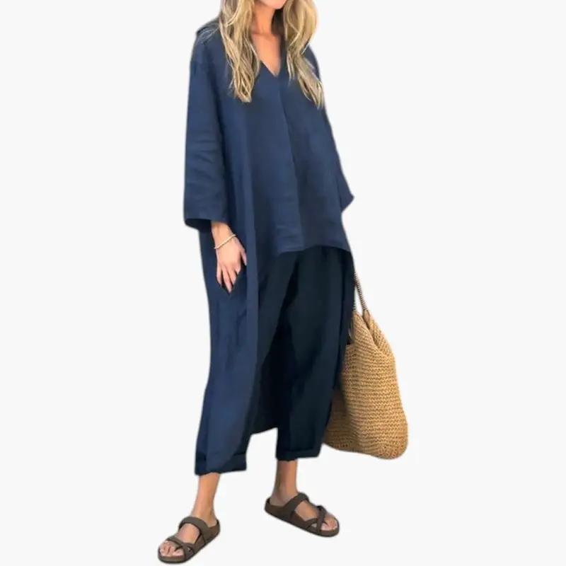 Women's navy two-piece outfit set with tunic-style top and full-length pants, loose fit